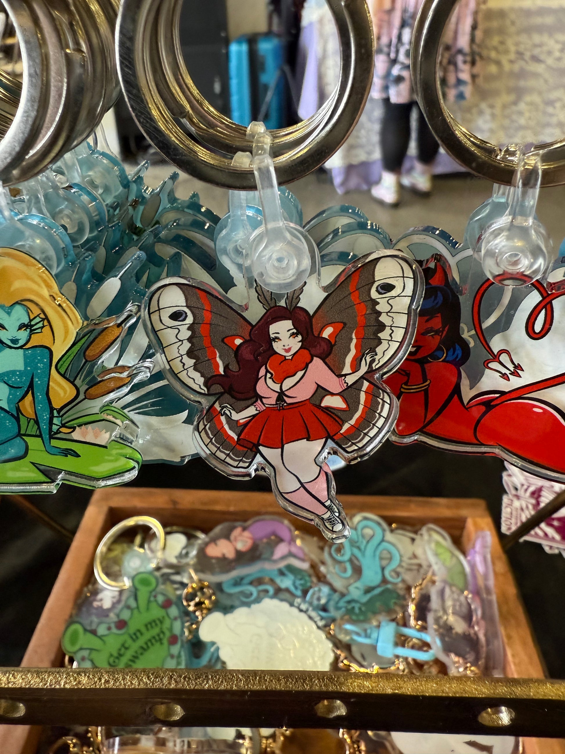 Mesmerized by the Mothwoman Keychain